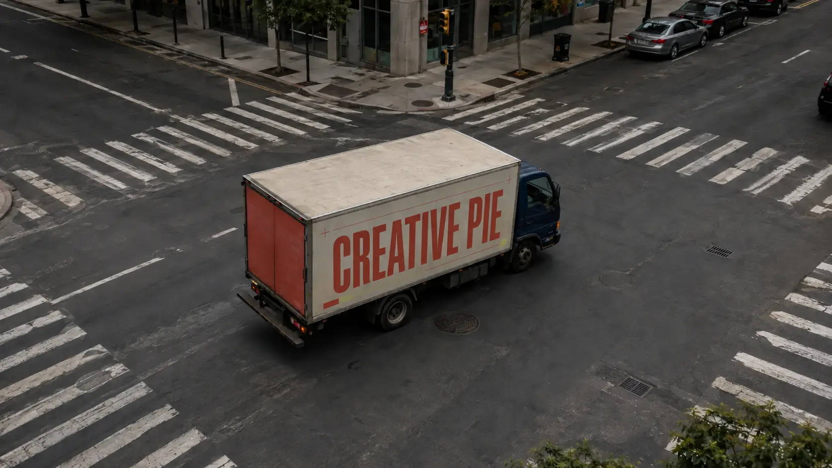 Illustrative Creative Pie-branded truck concept at a city intersection